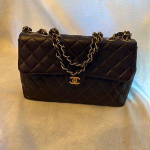 Chanel Large Jumbo Quilted Leather Flap Bag.